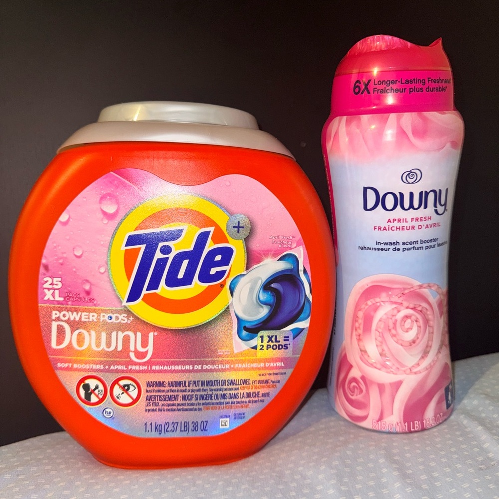Tide pods and downy scent beads set laundry washing clothes